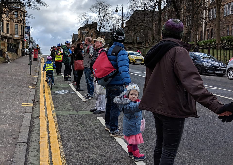 People of All Ages Formed a Human Bike Lane Today for Safer Cycling on University Avenue