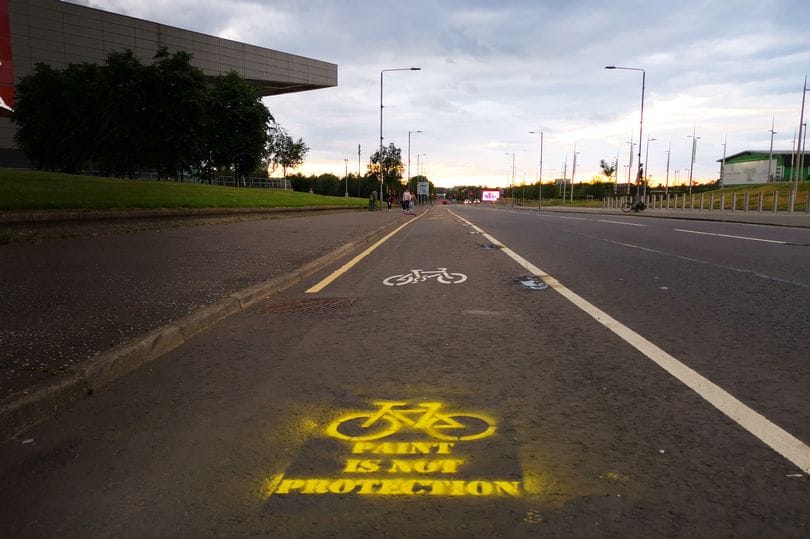 'Paint is not protection' stencilled on London Rd, Glasgow