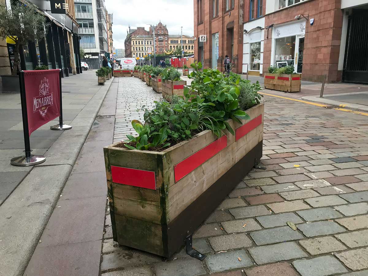 Planter boxes extend the pavement on Candleriggs in the Merchant City