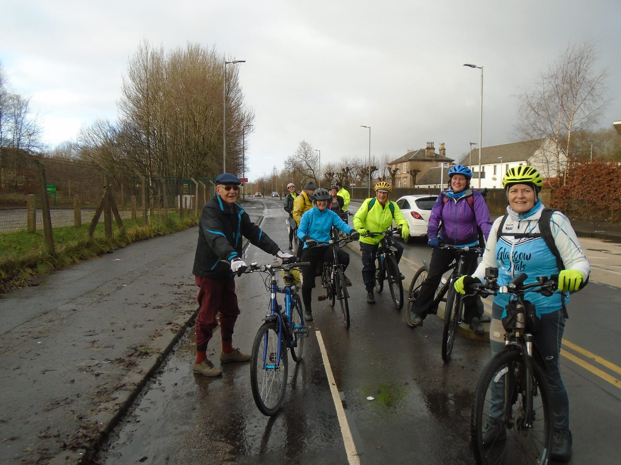 A group of GoBike members with their bikes on the East City Way cycletrack