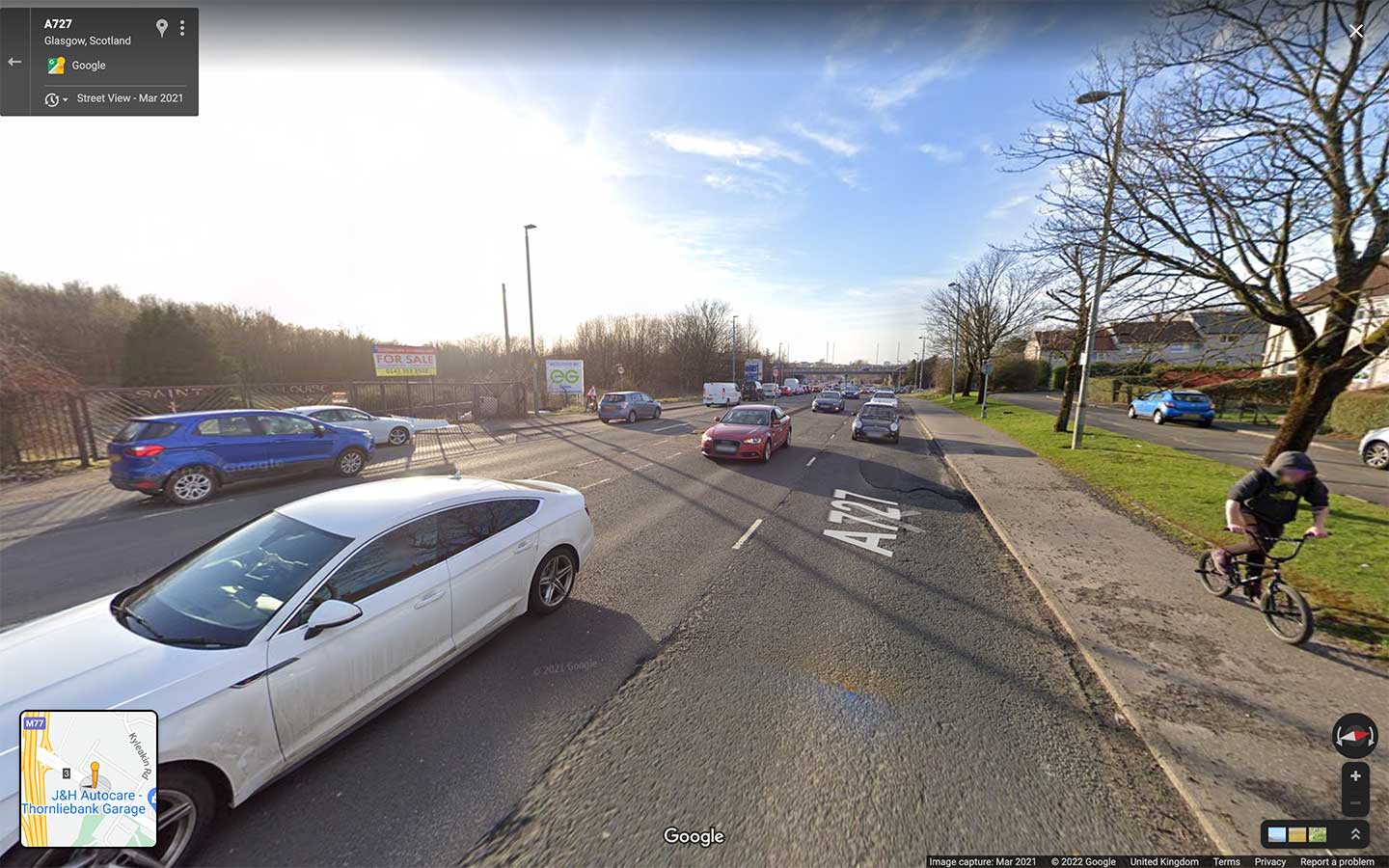 Nitshill Rd (A727) looking west towards development site and M77