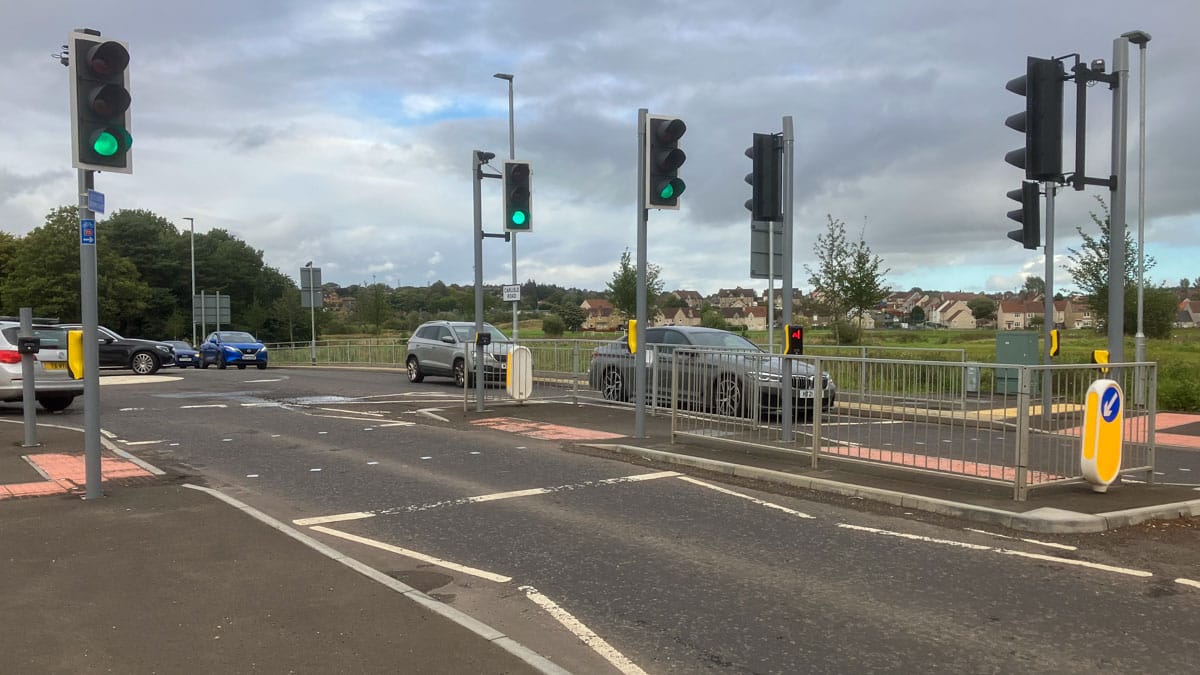 Toucan crossing on A73 Carlisle Rd, Airdrie with NCN75 and 'Cyclists Dismount' signs on left